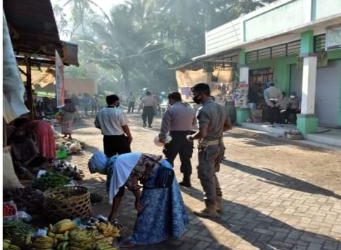 Polres Lombok Utara Bersinergi Dengan Brimob Dan TNI Membantu Pemerintah Memutus Mata Rantai Penyebaran Covid-19.